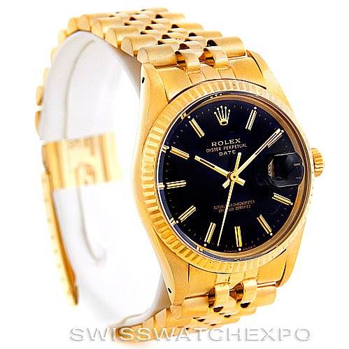 The Rolex Date 15037 Men's Yellow Gold Black Dial 15037 Men's Yellow Gold Black Dial model is shown from an angled side view, revealing its black dial, gold fluted bezel, and gold bracelet.