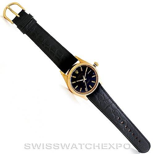 The image shows a Rolex Date 15037 Men's Yellow Gold Black Dial 15037 Men's Yellow Gold Black Dial watch laid flat, displaying the entire black leather strap, gold case, and black dial.