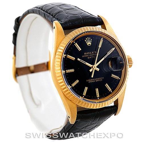 The image shows a Rolex Date 15037 Men's Yellow Gold Black Dial 15037 Men's Yellow Gold Black Dial watch with a black dial, gold fluted bezel, and a black leather strap, viewed from an angled front-left perspective.