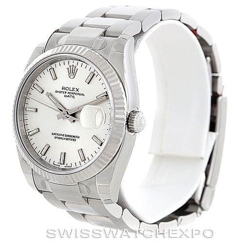 This image shows a Rolex Date 115234 Men's Stainless Steel Silver Dial 115234 Men's Stainless Steel Silver Dial model watch at a three-quarter angle, highlighting the dial, bezel, and part of the bracelet.