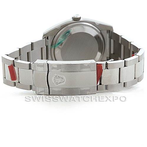 The image shows the back of a Rolex Date 115234 Men's Stainless Steel Silver Dial 115234 Men's Stainless Steel Silver Dial watch, focusing on the stainless steel bracelet and clasp.