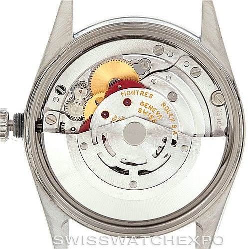 The image shows the internal mechanism of a Rolex Date 15200 Men's Stainless Steel Black Dial 15200 Men's Stainless Steel Black Dial model watch from the back, showcasing gears and the rotor.