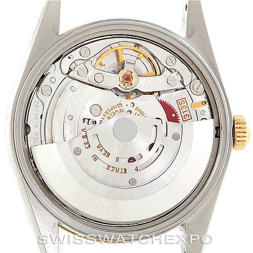The image shows the back view of a Rolex Date 15223 Men's Steel and Gold (two tone) Silver Dial 15223 Men's Steel and Gold (two tone) Silver Dial model, displaying the mechanical movement inside the watch case.