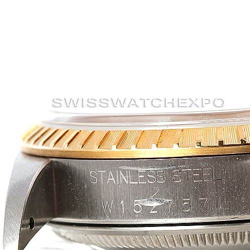 This image shows a close-up of the side of a Rolex Date 15223 Men's Steel and Gold (two tone) Silver Dial 15223 Men's Steel and Gold (two tone) Silver Dial model watch, highlighting the stainless steel case and the gold bezel.