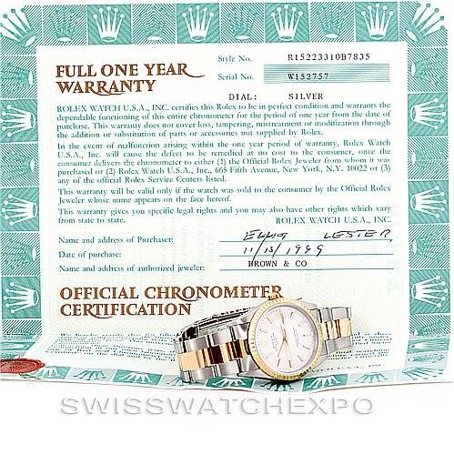 The image shows a Rolex Date 15223 Men's Steel and Gold (two tone) Silver Dial 15223 Men's Steel and Gold (two tone) Silver Dial model watch with its warranty card and official chronometer certification.