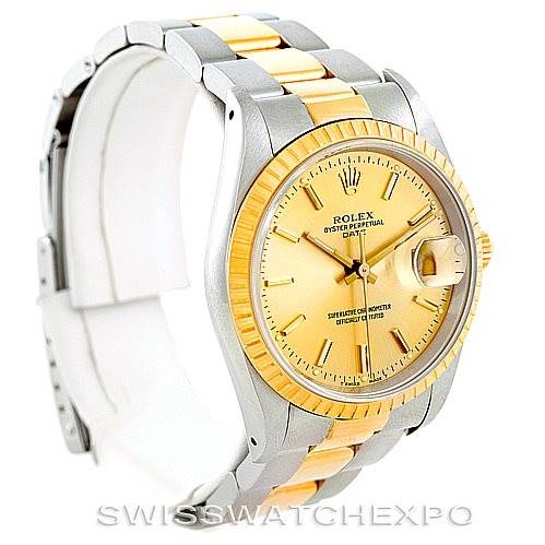 The image shows a Rolex Date 15223 Men's Steel and Gold (two tone) Champagne Dial 15223 Men's Steel and Gold (two tone) Champagne Dial model watch from a three-quarter front view, highlighting the bezel, dial, and bracelet.