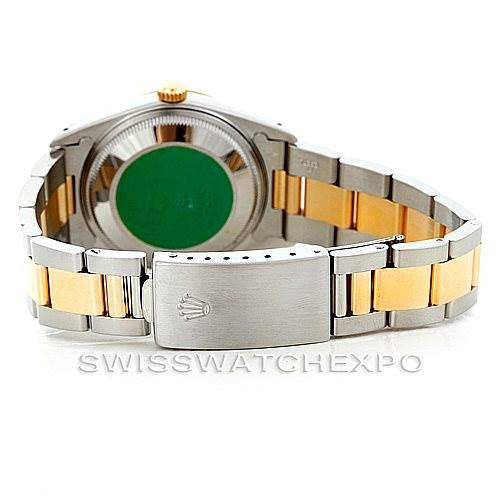 This image showcases the open clasp and the case back of a Rolex Date 15223 Men's Steel and Gold (two tone) Champagne Dial 15223 Men's Steel and Gold (two tone) Champagne Dial model watch, highlighting its two-tone bracelet.