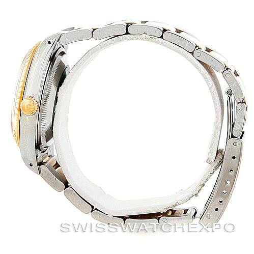 The image shows a side profile of a Rolex Date 15223 Men's Steel and Gold (two tone) Champagne Dial 15223 Men's Steel and Gold (two tone) Champagne Dial model watch, highlighting its band, case, and crown.