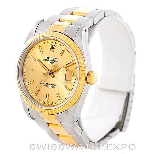 The image shows a Rolex Date 15223 Men's Steel and Gold (two tone) Champagne Dial 15223 Men's Steel and Gold (two tone) Champagne Dial model watch at a slight angle, displaying its face, two-tone bezel, and bracelet.