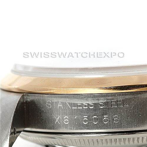 The image shows a close-up side view of the Rolex Date 15203 Men's Steel and Gold (two tone) White Dial 15203 Men's Steel and Gold (two tone) White Dial model watch case, highlighting the stainless steel part and the serial number.