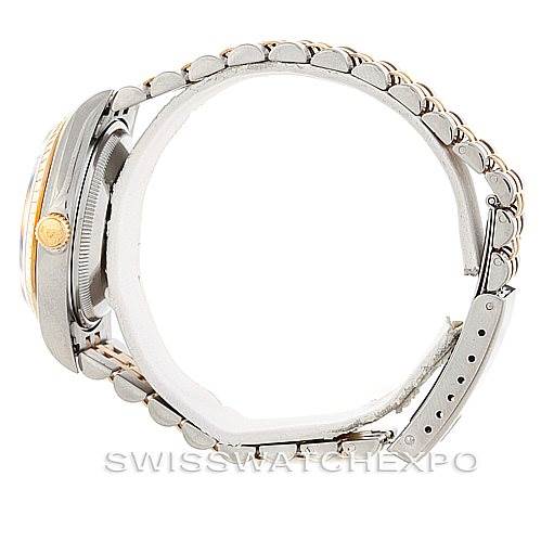 The image shows a side view of a Rolex Date 15223 Men's Steel and Gold (two tone) Blue Dial 15223 Men's Steel and Gold (two tone) Blue Dial model watch, highlighting the case, crown, and two-tone bracelet.