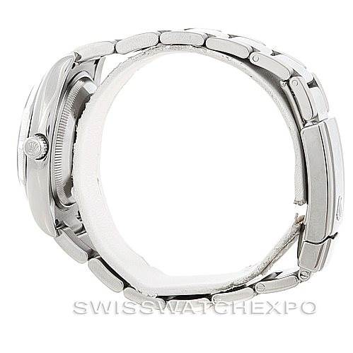 The image shows the side view of the Rolex Date 115210 Men's Stainless Steel Blue Dial 115210 Men's Stainless Steel Blue Dial model, highlighting the bracelet and the watch case.