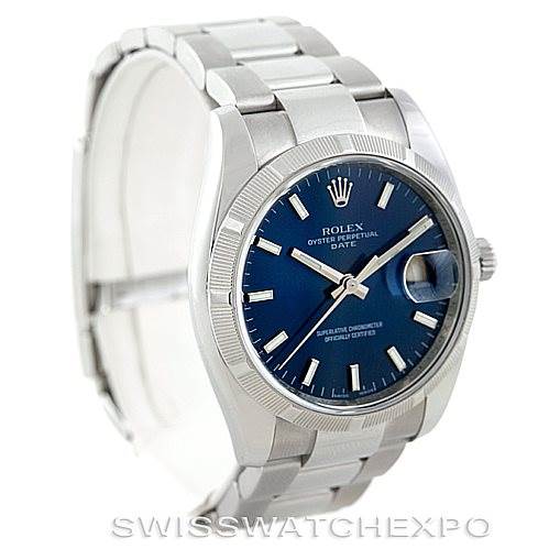 The image shows a Rolex Date 115210 Men's Stainless Steel Blue Dial 115210 Men's Stainless Steel Blue Dial model watch with a blue dial, stainless steel bracelet, and fluted bezel, angled slightly from the front-left.