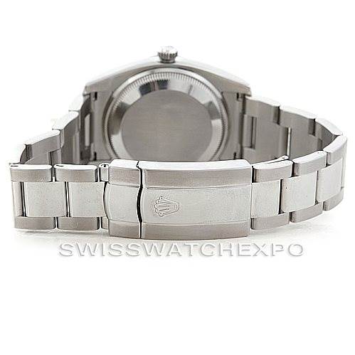 The image shows the back view of a Rolex Date 115210 Men's Stainless Steel Blue Dial 115210 Men's Stainless Steel Blue Dial model watch, focusing on the clasp and bracelet.