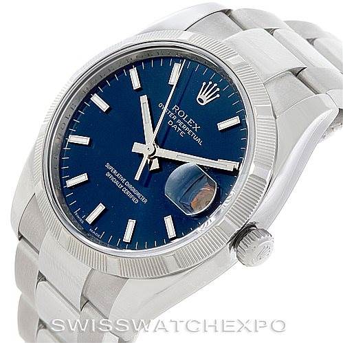 This image shows a close-up angled view of the Rolex Date 115210 Men's Stainless Steel Blue Dial 115210 Men's Stainless Steel Blue Dial model watch, highlighting the dial, crown, and bracelet.
