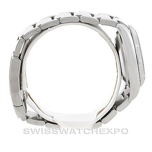 This image shows the side view of a Rolex Date 115210 Men's Stainless Steel Blue Dial 115210 Men's Stainless Steel Blue Dial model watch, particularly highlighting its bracelet and case.