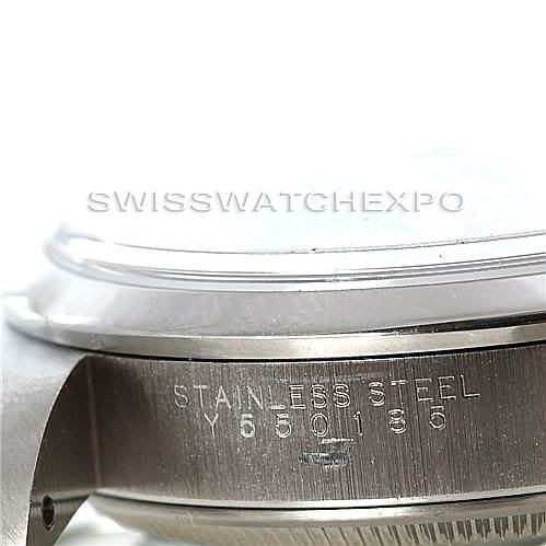 This image shows a close-up of the side and caseback of a Rolex Date 15200 Men's Stainless Steel Blue Dial 15200 Men's Stainless Steel Blue Dial model watch, highlighting the stainless steel marking and part of the serial number.