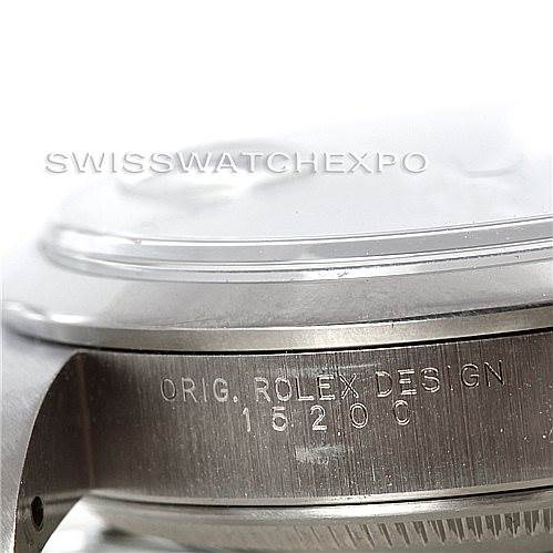 The image shows a close-up side angle of a Rolex Date 15200 Men's Stainless Steel Blue Dial 15200 Men's Stainless Steel Blue Dial model watch, focusing on the case engraved with "ORIG. ROLEX DESIGN 15200."