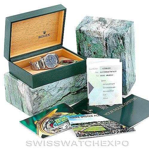 The image shows a Rolex Date 15200 Men's Stainless Steel Blue Dial 15200 Men's Stainless Steel Blue Dial watch in its open box with accompanying booklets and warranty card.