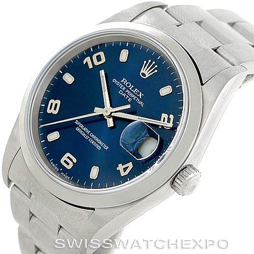 This image shows a Rolex Date 15200 Men's Stainless Steel Blue Dial 15200 Men's Stainless Steel Blue Dial model watch from an angled top view, highlighting the blue dial, watch hands, date window with magnifier, and part of the bracelet.
