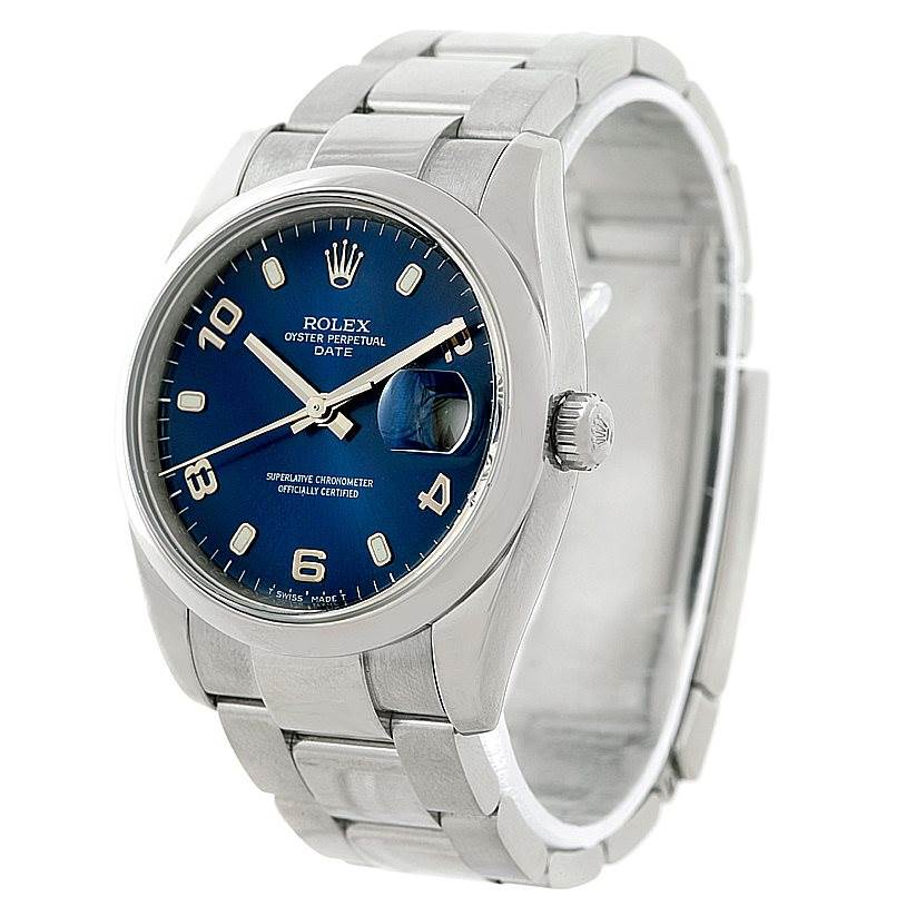 This image shows a Rolex Date 115200 Men's Stainless Steel Blue Dial 115200 Men's Stainless Steel Blue Dial model watch from a front-left angle, highlighting the dial, bezel, and bracelet.
