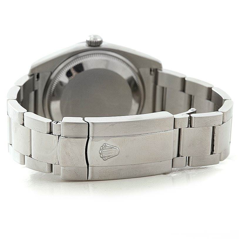 The image shows the backside and clasp of a Rolex Date 115200 Men's Stainless Steel Blue Dial 115200 Men's Stainless Steel Blue Dial model watch, highlighting the bracelet and case back.