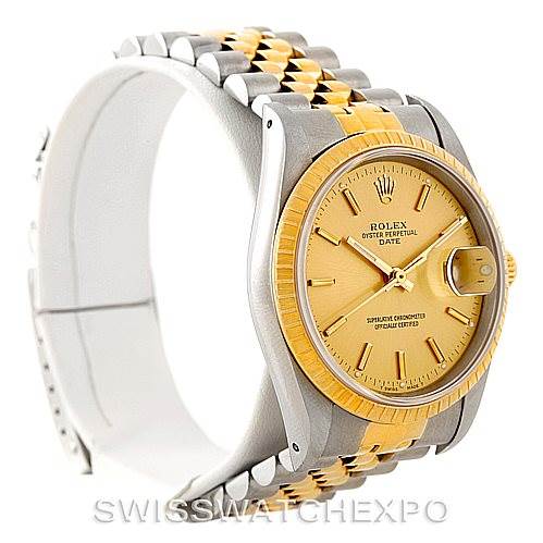 The image shows a side angle of a Rolex Date 15223 Men's Steel and Gold (two tone) Champagne Dial 15223 Men's Steel and Gold (two tone) Champagne Dial model watch, highlighting the dial, bezel, crown, and bracelet.