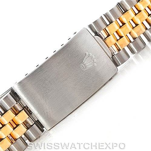This image shows a close-up of the clasp and bracelet of a Rolex Date 15223 Men's Steel and Gold (two tone) Champagne Dial 15223 Men's Steel and Gold (two tone) Champagne Dial model watch.