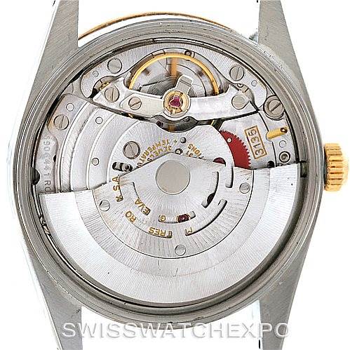 The image shows the inner movement components of a Rolex Date 15223 Men's Steel and Gold (two tone) Champagne Dial 15223 Men's Steel and Gold (two tone) Champagne Dial model watch from the back angle with the case back removed.