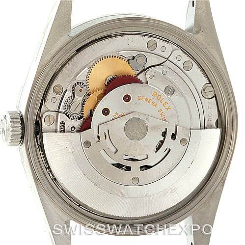 This image shows the inner mechanism of a Rolex Date 15200 Men's Stainless Steel White Dial 15200 Men's Stainless Steel White Dial model, viewed from the back, highlighting the movement and rotor.
