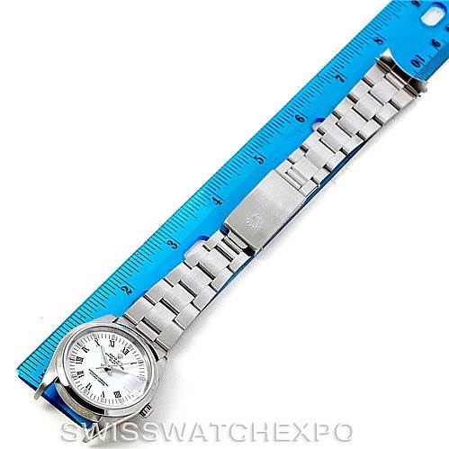 The image shows a Rolex Date 15200 Men's Stainless Steel White Dial 15200 Men's Stainless Steel White Dial model watch laid out flat with a blue ruler for scale, displaying the full bracelet and face.