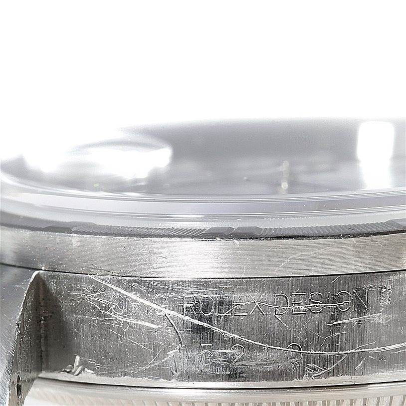 This image shows a close-up view of the case and bezel of a Rolex Date 15210 Men's Stainless Steel White Dial 15210 Men's Stainless Steel White Dial model watch.