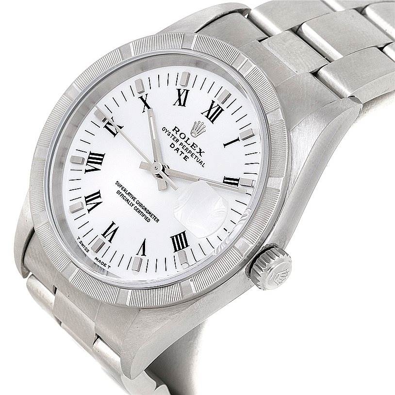 The image shows a Rolex Date 15210 Men's Stainless Steel White Dial 15210 Men's Stainless Steel White Dial model watch from a tilted front angle, highlighting its face, bezel, crown, and part of the bracelet.