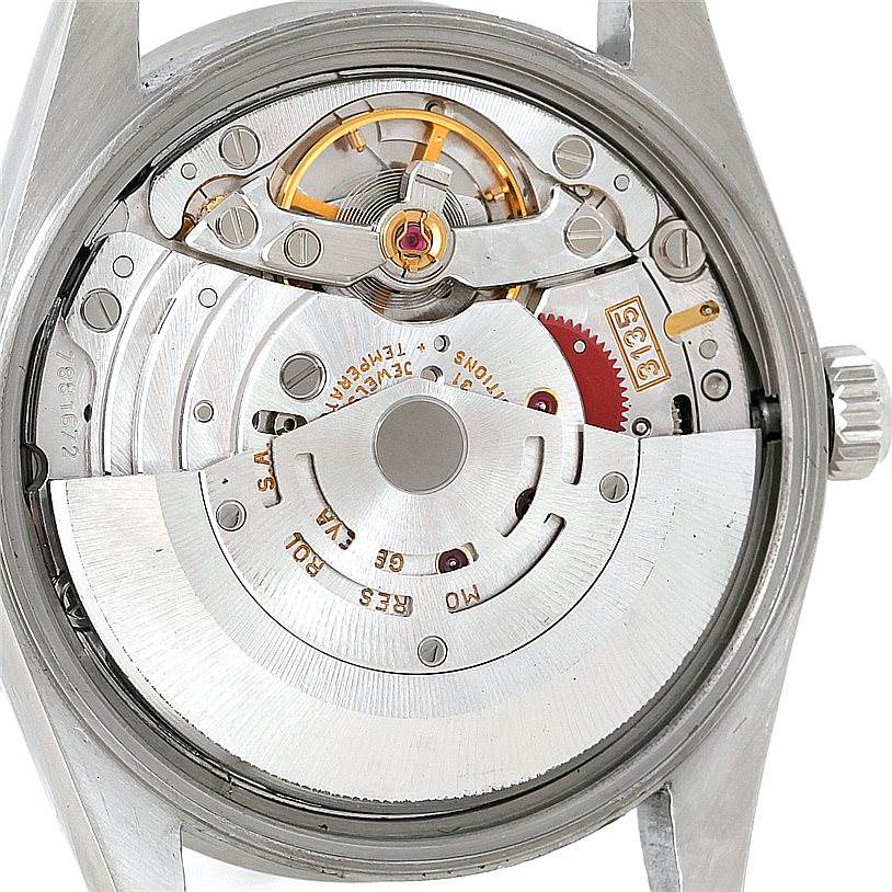 This image shows the internal mechanism of a Rolex Date 15210 Men's Stainless Steel White Dial 15210 Men's Stainless Steel White Dial model watch from a back angle with the case back removed.