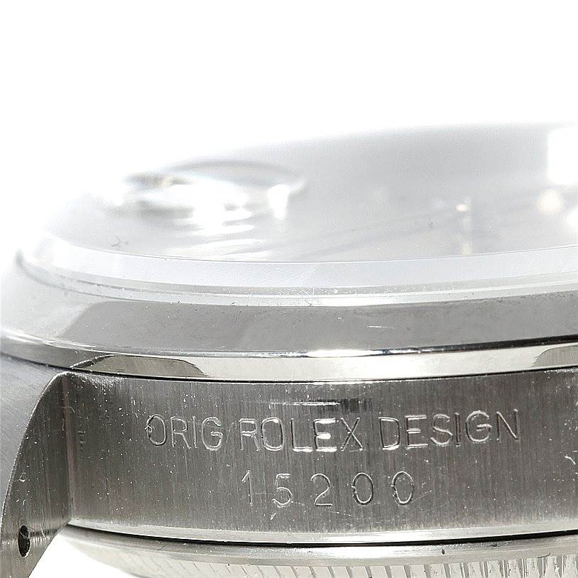 This image shows a close-up side view of a Rolex Date 15200 Men's Stainless Steel Silver Dial 15200 Men's Stainless Steel Silver Dial model, highlighting the watch case with "ORIG ROLEX DESIGN" and model number 15200.