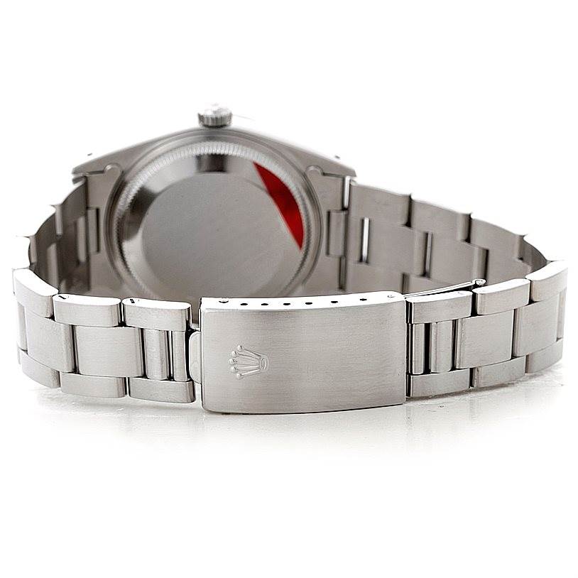 The image shows the backside and clasp of a Rolex Date 15200 Men's Stainless Steel Silver Dial 15200 Men's Stainless Steel Silver Dial model watch, highlighting the bracelet and case back.