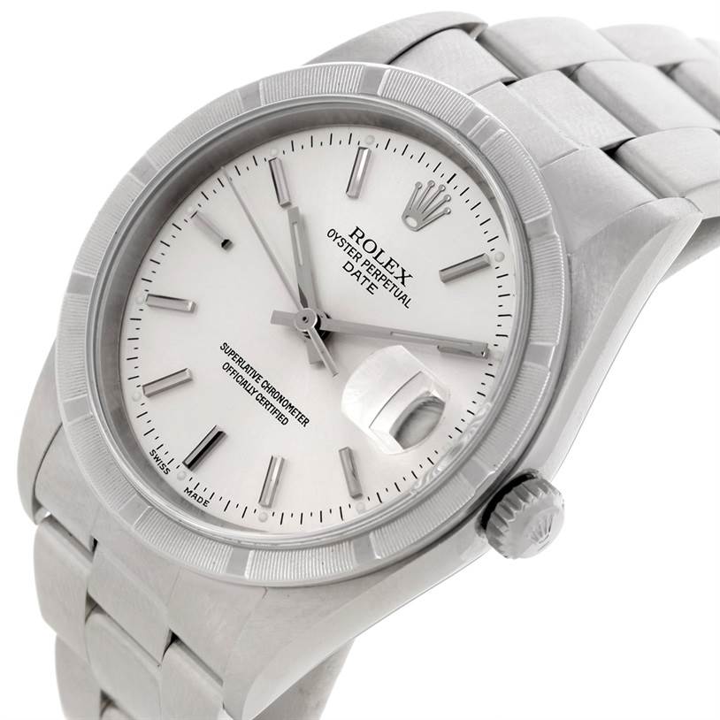 The image shows a close-up angled view of the Rolex Date 15210 Men's Stainless Steel Silver Dial 15210 Men's Stainless Steel Silver Dial model, highlighting the dial, bezel, crown, and part of the bracelet.