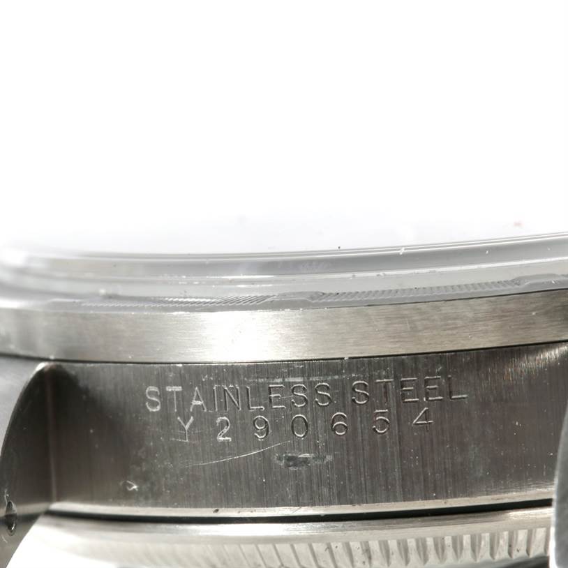 This image shows a close-up side angle of the stainless steel casing of a Rolex Date 15210 Men's Stainless Steel Silver Dial 15210 Men's Stainless Steel Silver Dial model watch.