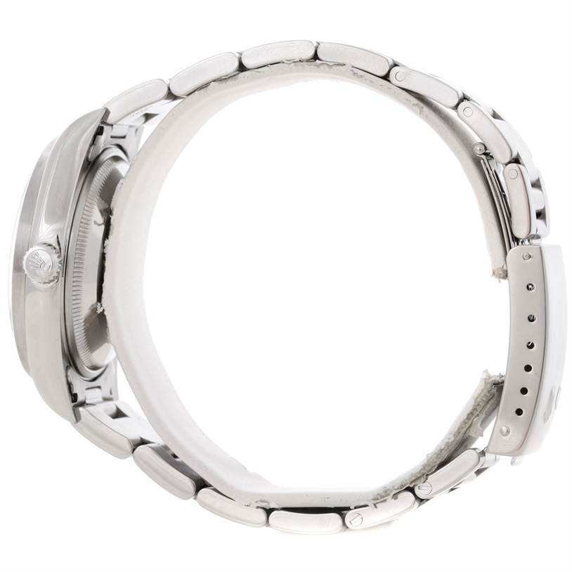 The image shows a side view of the Rolex Date 15210 Men's Stainless Steel Silver Dial 15210 Men's Stainless Steel Silver Dial model watch, displaying its case and bracelet.