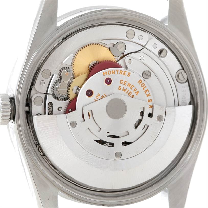 This image shows the internal mechanism and movement of the Rolex Date 15210 Men's Stainless Steel Silver Dial 15210 Men's Stainless Steel Silver Dial model watch from a back angle.