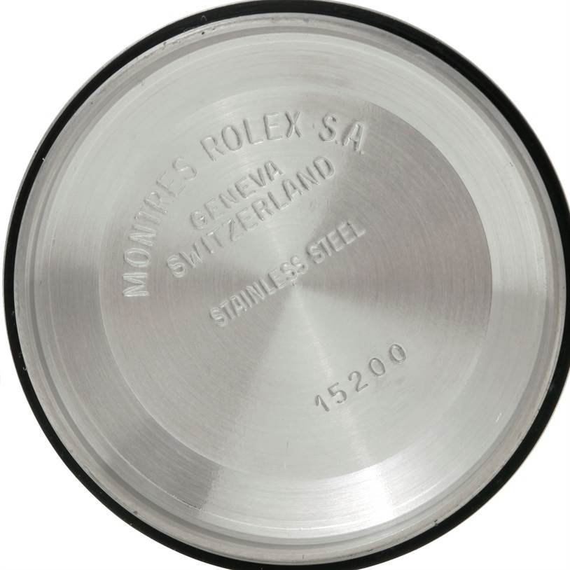 This image shows the stainless steel case back of a Rolex Date 15210 Men's Stainless Steel Black Dial 15210 Men's Stainless Steel Black Dial model with engravings.