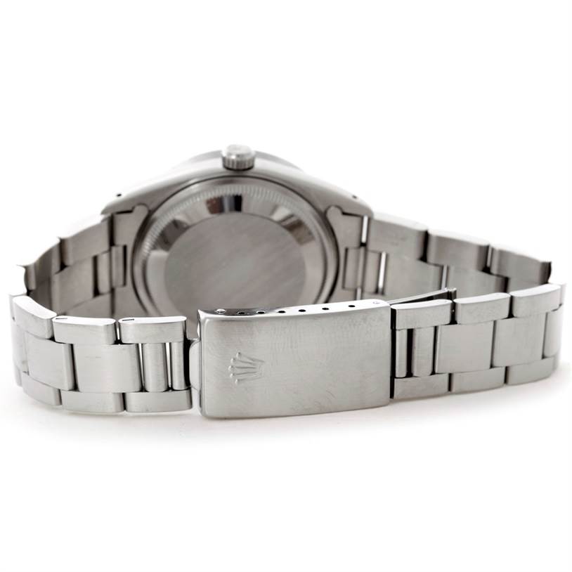 The image shows the back case and bracelet with clasp of a Rolex Date 15210 Men's Stainless Steel Black Dial 15210 Men's Stainless Steel Black Dial model watch.