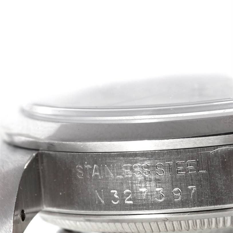 The image shows a close-up of the stainless steel case and serial number of a Rolex Date 15200 Men
s Stainless Steel Silver Dial 15200 Men
s Stainless Steel Silver Dial watch.