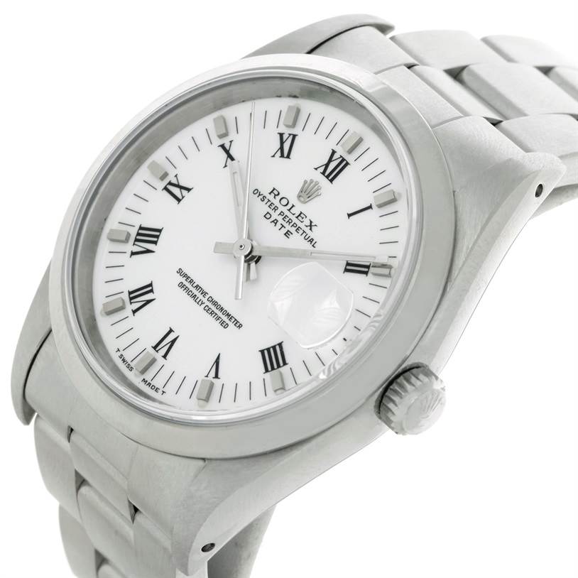 The image shows a Rolex Oyster Perpetual Date watch from an angled close-up, highlighting the face, case, and bracelet.