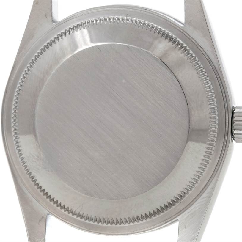 The image shows the back of a Rolex Date 15200 Men
s Stainless Steel Silver Dial 15200 Men
s Stainless Steel Silver Dial model watch, focusing on the caseback and crown.