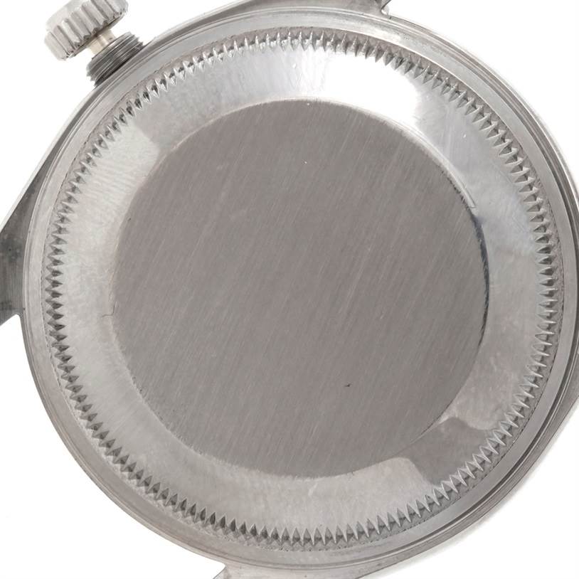 The image shows the back case and crown of a Rolex Date 15200 Men's Stainless Steel White Dial 15200 Men's Stainless Steel White Dial model watch from a close-up angle.