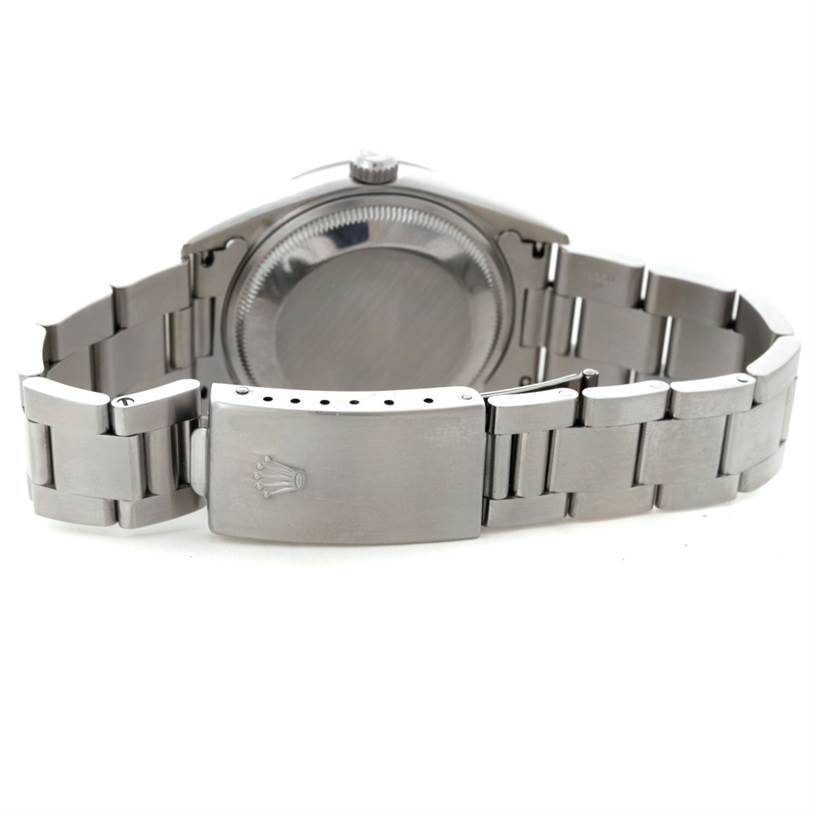 The image shows the back case and bracelet clasp of a Rolex Date 15200 Men's Stainless Steel White Dial 15200 Men's Stainless Steel White Dial model watch from a rear angle.