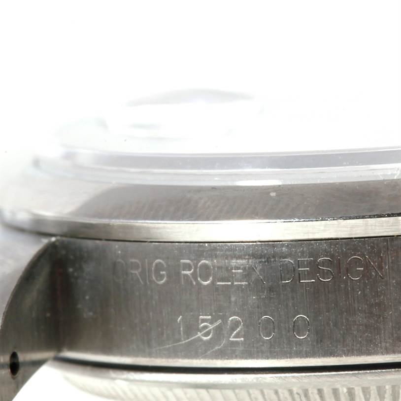 The image shows a close-up side view of the case back and bezel of a Rolex Date 15200 Men's Stainless Steel White Dial 15200 Men's Stainless Steel White Dial model, highlighting the engraved design number 15200.