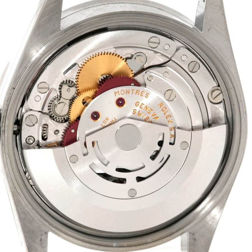 The image shows the backside view of the mechanism of a Rolex Date 15210 Men's Stainless Steel Pink Dial 15210 Men's Stainless Steel Pink Dial model watch.