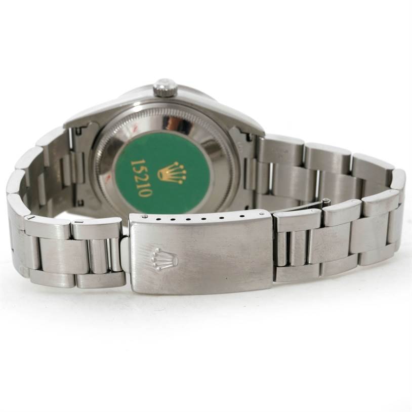 This image shows the back of the Rolex Date 15210 Men's Stainless Steel Pink Dial 15210 Men's Stainless Steel Pink Dial model watch, highlighting the clasp, bracelet, and case back with the Rolex logo.